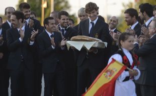 Fernando Llorente was inundated with Polish gifts as Spain arrived at their training base in sleepy Gniewino